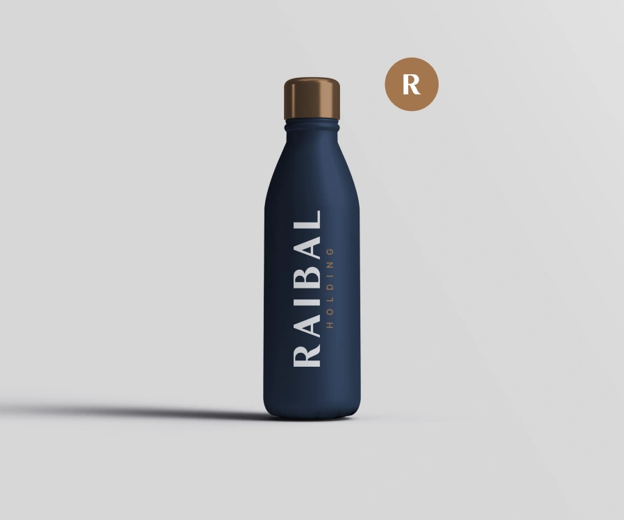 Bottle design visualisation with a vertical Raibal wordmark and bronze cap.