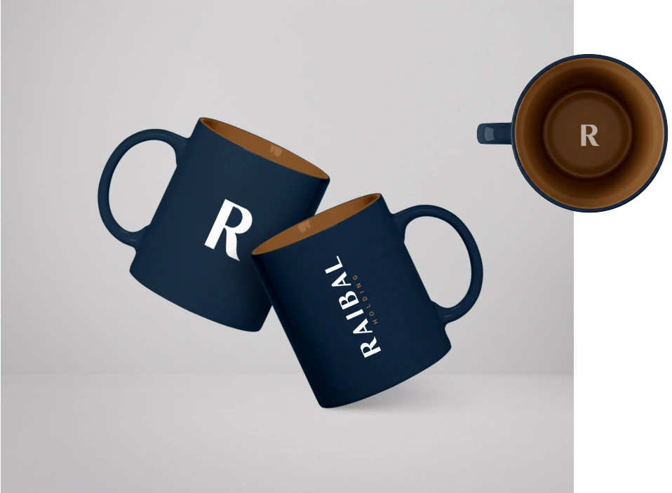 Raibal mug design visualisations using the wordmark and R initial.